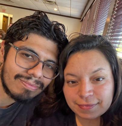 Daniel Gonzalez, pictured with girlfriend Tiffany Saldivar, is a 2010 Dublin High School graduate who makes the cheddar better in the Schreiber Foods cheese lab. Submitted photo