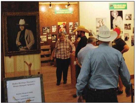 Dublin Rodeo Heritage Museum volunteers showed guests around during the Aug. 14 Secrets of the Museum event, which also included a showing of original art and refreshments. Paul Gaudette | Citizen staff photo