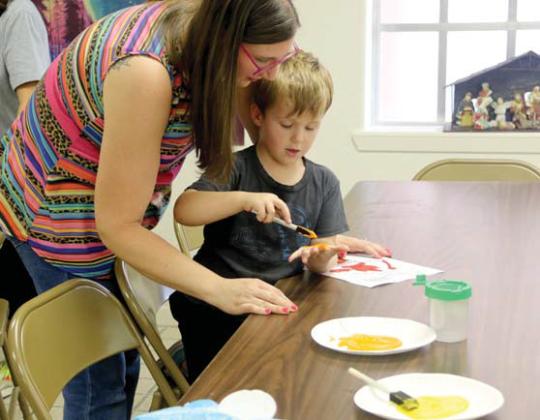 Pastor Weldon Branham at First Baptist Church talks to kids about God at the True North themed Vacation Bible School Monday, July 4-10. Kids were able to enjoy creating crafts, art projects, recreational activities and have dinner every night at the VBS. For more photos see The Dublin Citizen Facebook page. Wyndi Veigel-Gaudette | Citizen staff photos