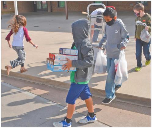 Kids donate 1,000+ goods for neighbors