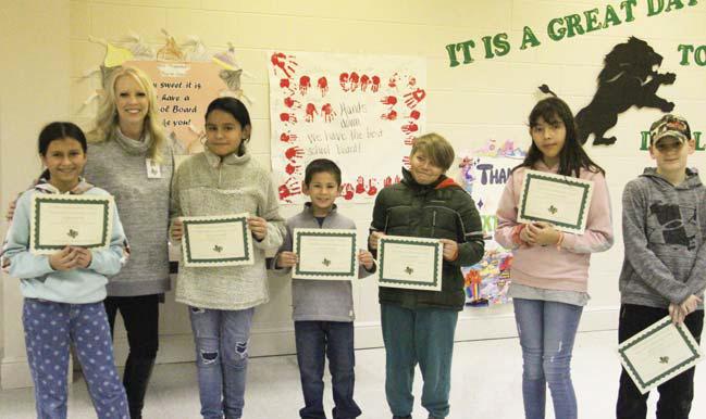 ‘Paws’itive Leaders Dana Sandoval and Jaron Winborn (4th grade), Cecilia Garcia and Luke Thompson (5th grade) and Arian Cormack and Harlyn Wiley(6th grade). Presented by Principal Amanda Lisso.