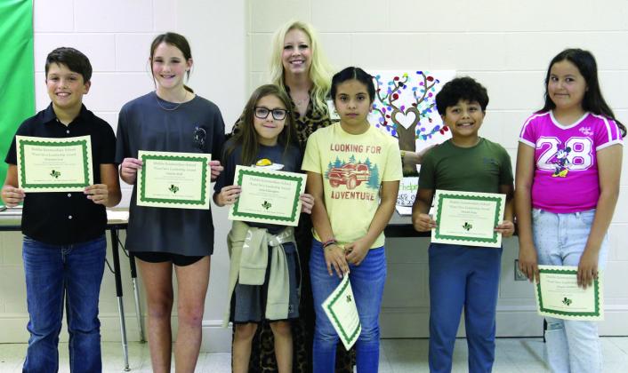 ‘Paws’itive Leadership Daniel Ruiz and Kinzie Sanders (4th grade), Maythe Cisneros and Silas Eddington (5th grade) and Charli Hall and Branson Ivie (6th grade). Presented by Principal Amanda Lisso.