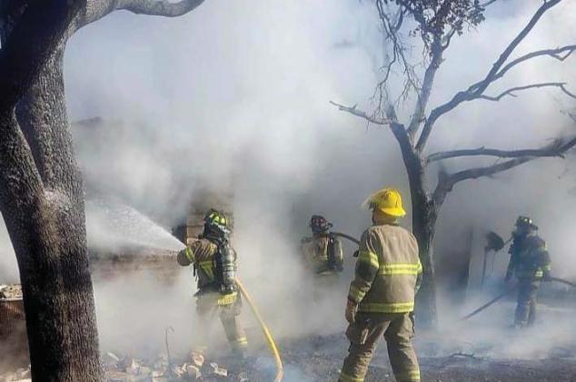 Multiple agencies including Erath County Volunteer Fire Rescue, Bluffdale VFD, Hico Volunteer Fire Department, Erath County EMS and Erath County Sheriff’s Office help at a structure fire near Duffau. Submitted photo