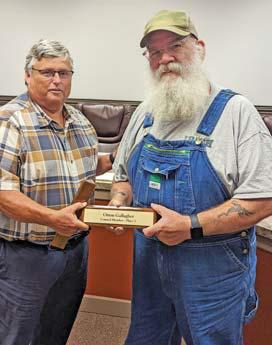 Above left, outgoing councilmember Keegan McInroe is presented an appreciation plaque by Dublin Mayor David Leatherwood. Right, outgoing councilmember Orion Gallagher is presented a plaque also by Mayor Leatherwood. Paul Gaudette | Citizen staff photo