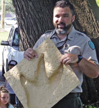 Dinosaur Valley State Park Rangers, Texas Master Naturalists, and Dairy Queen-Dublin are determined to get kids to dig into summer reading at the Dublin Public Library with its program about animals, dinosaurs and fossils Thursday, May 28. Participants got to go hands-on in several digs including one with real fossils and miniature dino figurines. The library will be offering a variety of Summer Reading programs throughout the months of June and July. Wyndi Veigel-Gaudette | Citizen staff photos