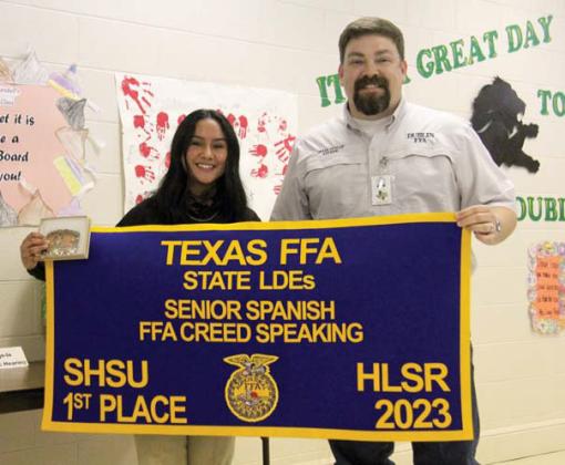 Top in State Dublin Junior Vanessa Pantoja was presented with a belt buckle and a special proclamation for being Number One in State in Senior Spanish FFA Creed Speaking. Presenting the award was FFA Sponsor Derek Dunlap.
