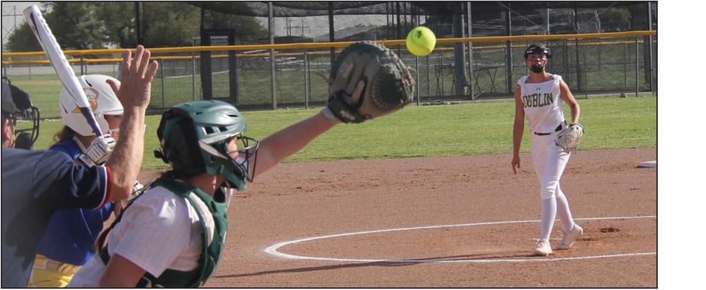 Dublin varsity Lady Lion Catcher Cassidy Adair leans in to receive a pitch from Olivia Salyer during the March 31 home against Brock, which resulted in a loss for the home team. The Lady Lions continued to grow as a team against tough opponents with an away loss to Eastland on March 28 before returning home for the Brock game. Wyndi Veigel I Citizen staff photo
