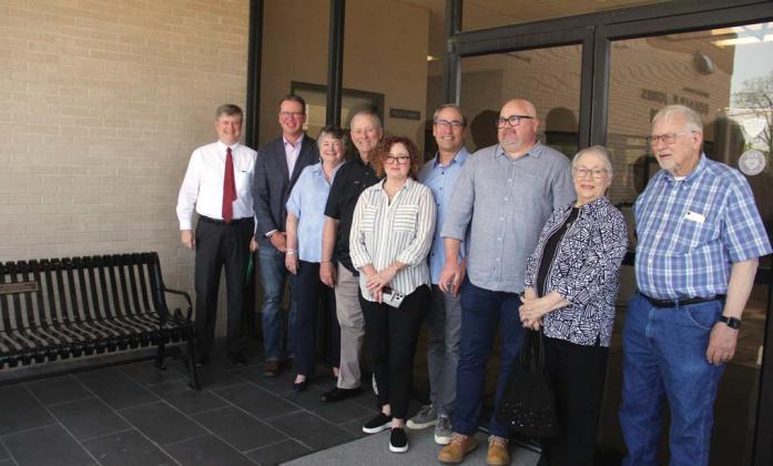 The Jones Family along with County Judge Brandon Huckabee and District Attorney Alan Nash pose for a photo alongside a bench dedicated in honor of K. Ewell and Fritzi Lucille Jones at the Donald R. Jones Justice Center. Wyndi Veigel-Gaudette | Citizen staff photo