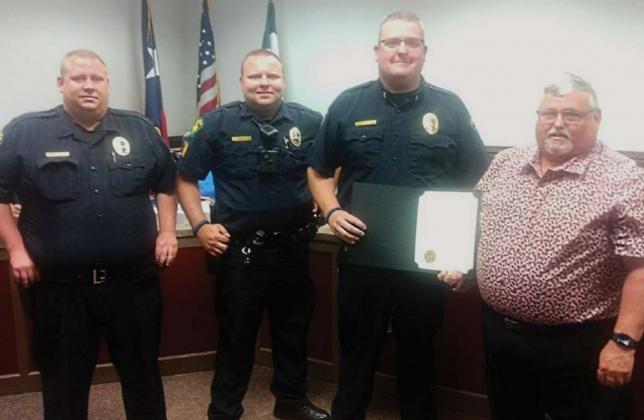 Dublin City Council approved resolutions during Monday’s meeting announcing May 15-21 as Police Week and EMS Week to coincide with the nationally recognized weeks. Dublin City Mayor David Leatherwood presented the resolutions to member of Dublin PD (above) and Dublin EMS (below). Paul Gaudette | Citizen staff photo