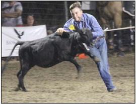 Ethan Whitaker, a freshman at Dublin High School, showcases his skills in calf roping at the rodeo. Wyndi Veigel | Citizen staff photo