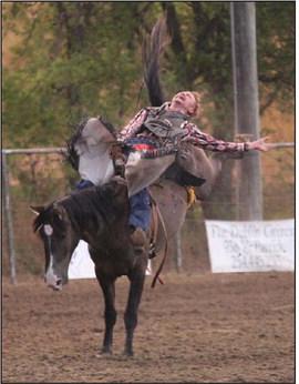 A cowboy competed in the bronc riding event Saturday night at the rodeo. Wyndi Veigel | Citizen staff photo