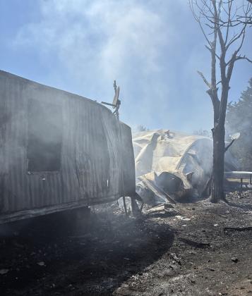 Dublin, Hico, Carlton, Erath County and personnel from the Stephenville Fire Department battle a mobile home structure fire on FM 219 toward Carlton Friday, July 31. The home was a complete loss and the family lost pets, though no people were injured. Submitted photo
