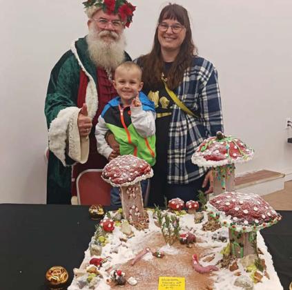 Tiffany Golightly received first place in the gingerbread house competition hosted by Revitalize Dublin. The houses will all be on display through the end of the week at Grafton Market (118 S. Grafton Street). More will be showcased in next week’s edition. Courtesy photo