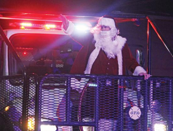 Santa waves to crowds in the annual parade Saturday, Dec. 2. For more Christmas event photos check out the Dublin Citizen Facebook page. Paul Gaudette | Citizen staff photo