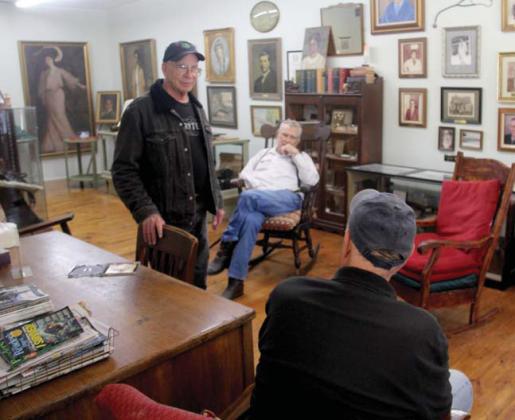 Paul Gaudette | Citizen staff photos Above, Dublin Historical Museum volunteers enjoy refreshments and talking to one another at an appreciation event. Right, Dublin Historical Society President talks to fellow volunteers inside the museum. The museum is located at 118 W. Blackjack St.