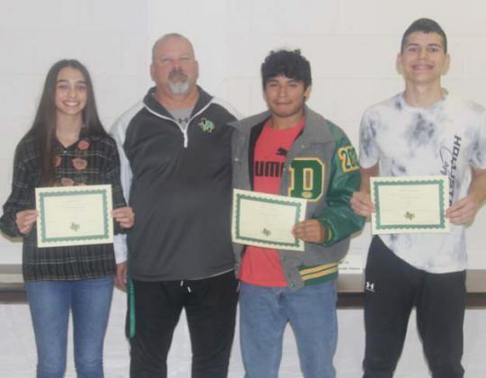 Athletic Scholars for November and December November: (not present) Jayden Balvantin and (not present) Ashton Munoz (Junior High School) and Alonso Moreno and Olivia Salyer (High School). December: Jax Johnson (not present) and Kimberly Ortiz (not present) (Junior High) and Aidan Hernandez and Yesenia Osoria (not present) (High School). Presented by Athletic Director Greg Hardcastle.