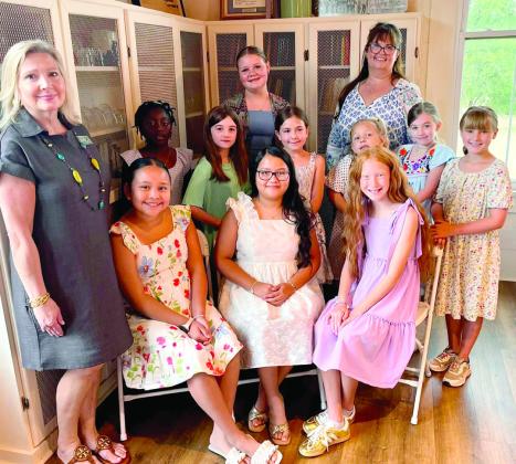Above, young ladies of all ages participated in this year's Manners Camp, instructed by CTFAC Executive Director Christine Newton and Kelijon Nance. Below, are the young men who participated. Submitted photos