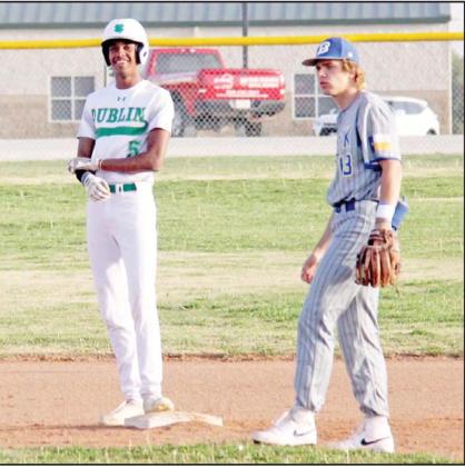 Dublin Lion Dalan Rasberry smiles at second base after scoring one of the only hits against state-ranked Brock in the March 30 home game. Wyndi Veigel I Citizen staff photo