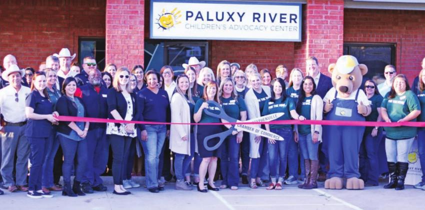 The Paluxy River Children’s Advocacy Center was joined by the Stephenville Chamber of Commerce and neighbors in the Erath County community for a ribbon cutting on Nov. 30. Corrie Conner | Citizen staff photo