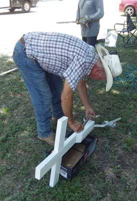 Courtesy photos While putting a new roof on the Little Church on Grafton, Jeff Humphrey of Superior Roof Systems created a new cross. One of his helpers put it on top of the steeple. ‘How nice is that? We thank him very much,’ organizers of the Little Church on Grafton said.