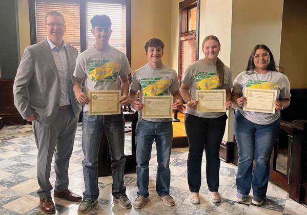 Erath County Judge Brandon Huckabee recognizes Dublin High School powerlifters at the Monday, April 8 Commissioners Court. Lifters include from right, State Champion Mariana Ortiz, who took top honors for her weight class in 3A, Cassidy Adair (8th place), Cameron Patton (11th place) and Elijah Gonzales (14th place). Submitted photo