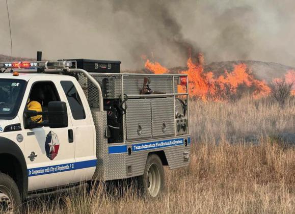 Stephenville firefighters traveled to the Texas Panhandle last week to aid in the largest wildfire in the state’s history. Many firefighters along with ranchers and volunteers are aiding the area by providing resources including hay and livestock feed. Submitted photo