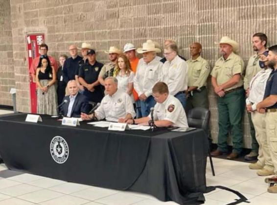 Abbott visits area for fire declaration