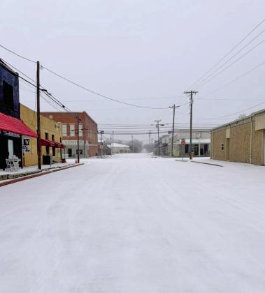 An icy downtown is showcased during Winter Storm Fern. Ryan Mitchell Courtesy photo