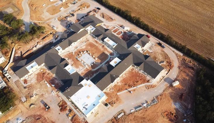 This aerial photo shows the new long-term care nursing home being built in Comanche County. One of the largest new buildings built in the county in many years, it is located adjacent to the CCMC Hospital and outpatient services on TX-16. The not-for-profit care center is in the final phases of being built. Residents with questions or who want to add a prospective resident to the growing waitlist can email nstark@comanchecmc.com or call 254-879-4999. | submitted photo