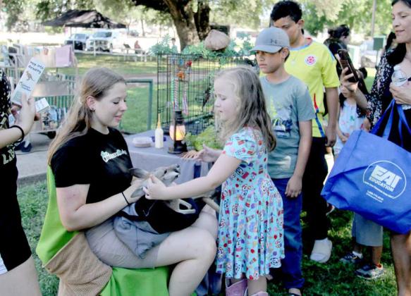 Kids at the Dublin Public Library learn all kinds of animal knowledge Thursday, June 6 thanks to the Creature Teacher. Above, Peaches the Kangaroo enjoys some gentle pets from the kids. The Red Kangaroo is only 7 months old. Wyndi Veigel-Gaudette | Citizen staff photo