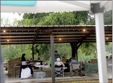 Vendors sit under canopies Saturday, Sept. 16 at Dublin Market Days while much needed rain falls outside. Though the market had sparse customers everyone was happy for the rain. Wyndi Veigel | Citizen staff photo