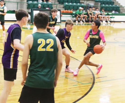Dublin athlete Alex Teten moves to get the ball past Early defense during a summer basketball game in the DHS Neff Gym Monday, June 16. Paul Gaudette | Citizen staff photos