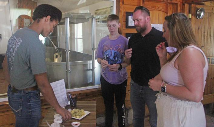 In honor of Valentine’s Day, Veldhuizen Cheese hosts a release party Saturday, Feb. 8 for its new cheese, ‘Ashes of my Ex.’ The cheese features ashes throughout alongside other tasty cheesy notes. The event featured kids activities, a bonfi re with marshmallows, wine tastings from J.W. Hardin Winery in Comanche and Lily B’s Boutique. Wyndi Veigel-Gaudette | Citizen staff photo