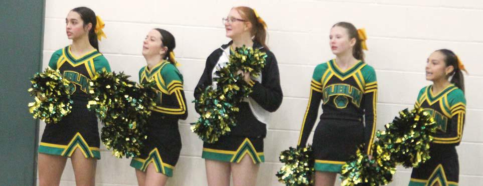 Paul Gaudette | Citizen staff photos Dublin Lions cheerleaders stood at the end of the gym, offering cheers to make the crowd get loud and chants to support Dublin kids lining up shots.