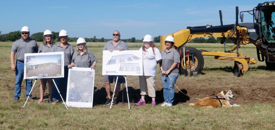 The Erath County Humane Society Board along with Executive Director Serena Wright unveil plans for the new Humane Society shelter. Grace, the Humane Society’s dog that was up for adoption for nine years was also present to receive pets and attention. Wyndi Veigel-Gaudette | Citizen staff photo