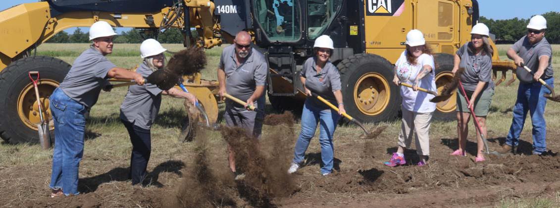 Above, The Erath County Humane Society Board of Directors and Executive Director Serena Wright toss dirt in the air during the new shelter’s groundbreaking ceremony Friday, June 27. Below, crowds of people gather on the 17-acres where the new Humane Society shelter will be built. Wyndi Veigel-Gaudette | Citizen staff photo
