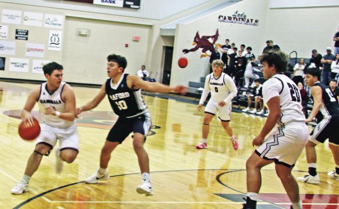 The Lingleville Lady Cardinals (above) and Cardinals squared off with Graford in games at the Lingleville gym Friday, Nov. 14. The home teams fought hard by games ending in 75-15 and 91-29 defeats for the Lady Cards and Cards respectively. Paul Gaudette | Citizen staff photos