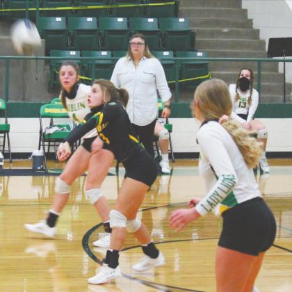 Lady Lion Rianna Turner digs a downed ball to help her teammates at Saturday’s home game against Bangs. Sara Gann | Citizen staff photo