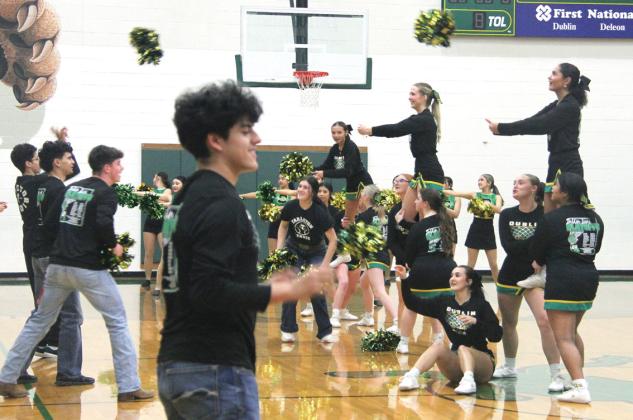 Dublin Cheerleaders provide some spirited practice for the Lions basketball boys in a Feb. 18 pep rally before their bi-district playoff game. Cheerleaders were raised by squadmates as they made hoops with their hands for players to throw pom-poms. Classes competed against each other in the contest with seniors sinking the most. Wyndi Veigel-Gaudette | Citizen staff photo