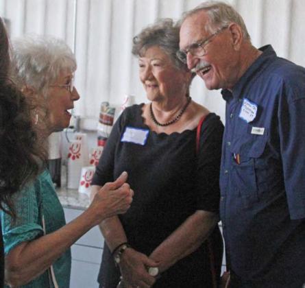 Classmates visit with each other at the annual reunion. Paul Gaudette | Citizen staff photo