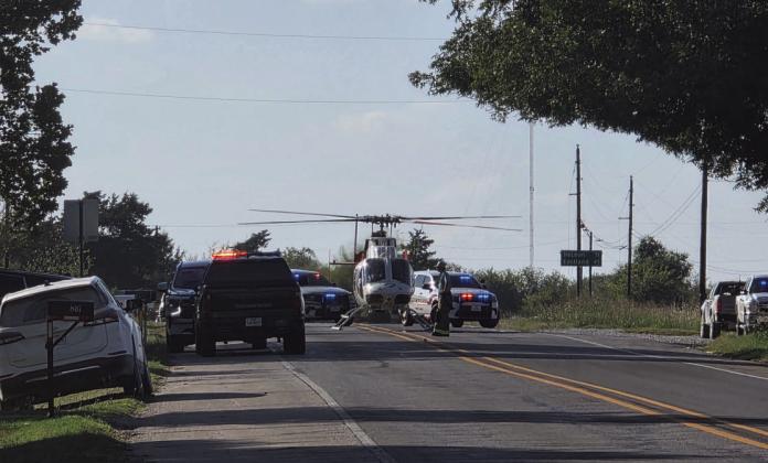 Marcus Allen Burleson is airlifted from a wreck scene on Blackjack after the vehicle traveled into the Zinck home Thursday, Oct. 9. Burleson later passed away. Wyndi Veigel-Gaudette | Citizen staff photo