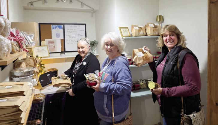Customers enjoy the grand opening of Flour Riot, a cashierless bakery located inside Blackjack Office Center at 126 E. Blackjack. The new business and bakery offers a variety of tasty treats made with simple ingredients, and features a variety of bakers. Wyndi Veigel-Gaudette | Citizen staff photo