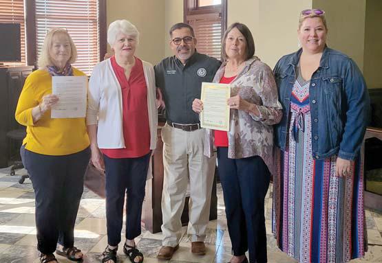 Wyndi Veigel | Citizen staff photo Members of the Daughters of the American Revolution along with County Judge Alfonso Campos have a proclaimation signed for Constitution Week Sept. 17-23.
