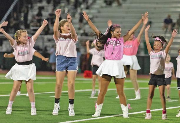 Mini Cheer, Drill Team take the fi eld