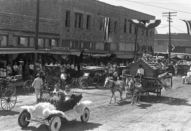 Everyone looked forward to the colorful veterans parades in Dublin. In 1915 the model T Ford owned by Mr. Lovelace won first place for best decorated in the parade. Behind the model T Ford was the float by Foust Lumber Yard. The wagon was pulled by two white horses. The banner reads “Foust and his Boys Build Houses.” Courtesy photo
