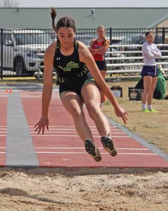 Dublin High School Junior Olivia Salyer comes back down to Earth in the girls long jump event at Dublin High School. She is advancing to Area after placing third. Paul Gaudette | Citizen staff photo