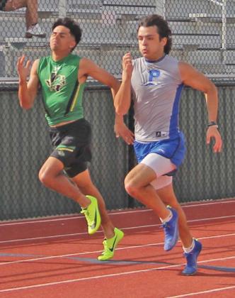 Dublin High School senior Kaden Gaitan rounds a runner in the boys 200 meter dash to places second in the event. He advances to area in Graham on April 10. Wyndi Veigel-Gaudette | Citizen staff photo