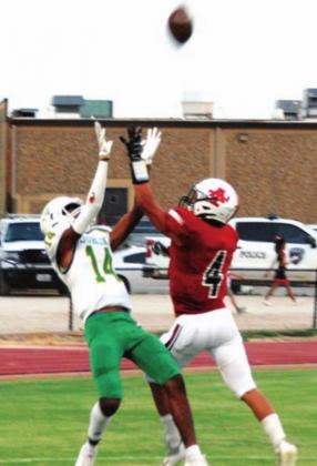 Dublin Lion Dalan Rasberry ducks Anson defense to receive the ball during the Lions’ Sept. 10 away game. Rasberry had a strong showing against Brady Friday night, completing two touchdowns and earning the pick for athlete of the week. Paul Gaudette | Citizen staff photo