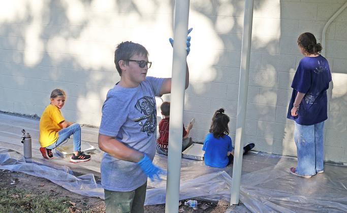 Dublin Cub Scouts and 4H students volunteered at the Dublin City Park Saturday, Oct. 10 giving a fresh coat of paint to fencing and the City Pool building. The volunteer efforts coincided with National 4-H Week, Oct. 4-10, 2026. Paul Gaudette | Citizen Staff photos