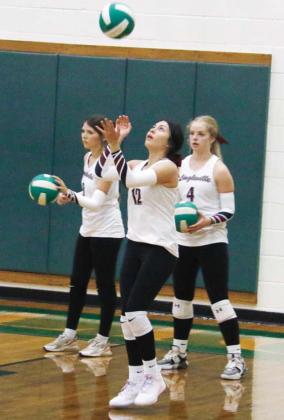Lingleville Lady Cardinals practice hits before their game with Dublin in the Neff Gym Friday, Aug. 15. Paul Gaudette | Citizen staff photo